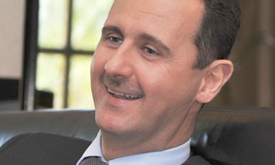 Via l'onorificenza italiana ad Assad 